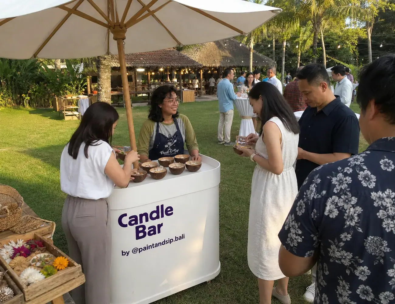 Candle Bar event team preparing a booth for guests