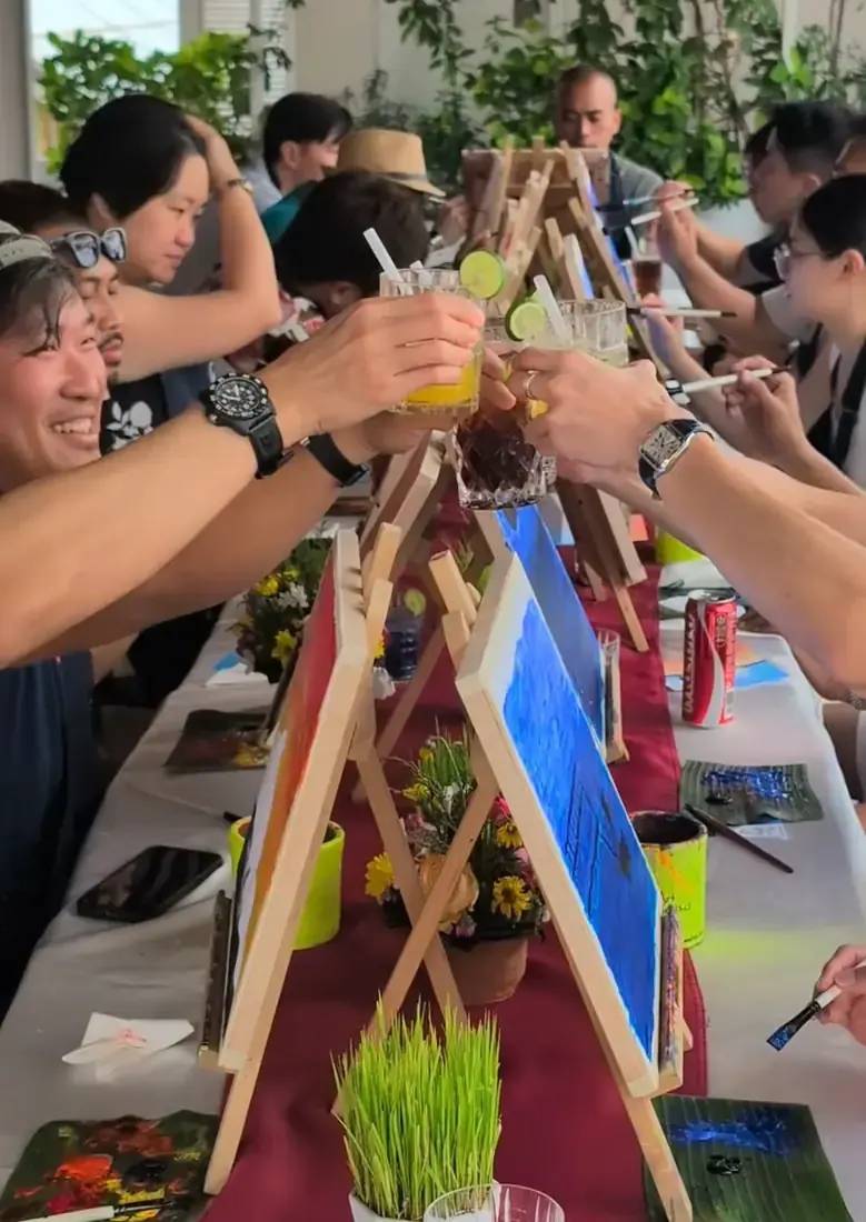 Guest painting at a private Paint and Sip Ubud party