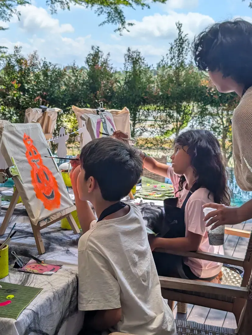 Private event guests painting with Paint and Sip Ubud