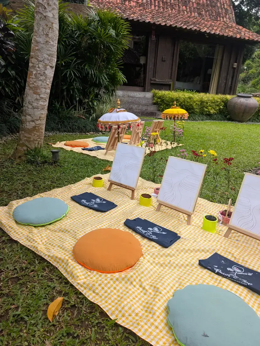 Paint and sip guests smiling during a private party