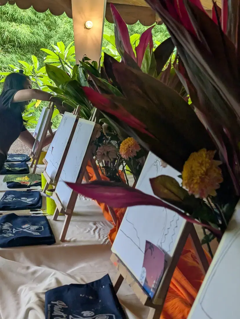 Paint party guests enjoying a creative Bali workshop