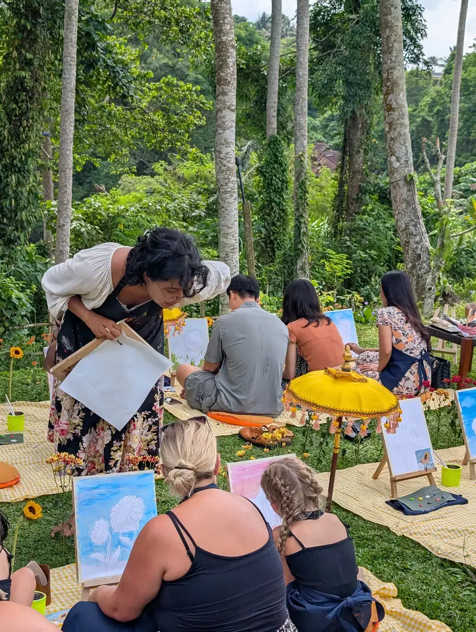 Picnic Paint and Sip art setup with supplies in Bali